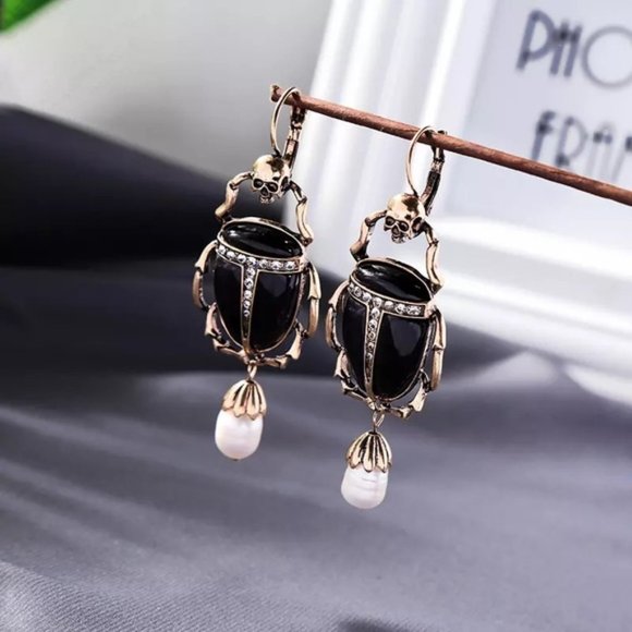 Anthropologie Jewelry - FREE SHIPPING! Skull Earrings With Purple Scarabs